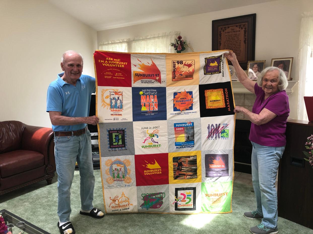 Ray and Pat Demski display the Sunburst blanket in June 2020 that their daughter-in-law, Kelly Demski, created from T-shirts. Ray has volunteered for every Sunburst.