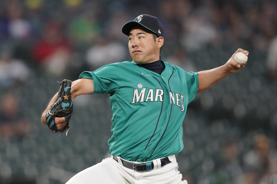 Seattle Mariners starting pitcher Yusei Kikuchi throws to a Tampa Bay Rays batter during the sixth inning of a baseball game Friday, June 18, 2021, in Seattle. (AP Photo/Ted S. Warren)