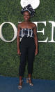 <p>Lupita Nyong’o wore a fun plaid crop top, combined with high-waisted black cigarette pants and silver sandals while attending the US Open. <i>(Photo by Jean Catuffe/GC Images)</i></p>