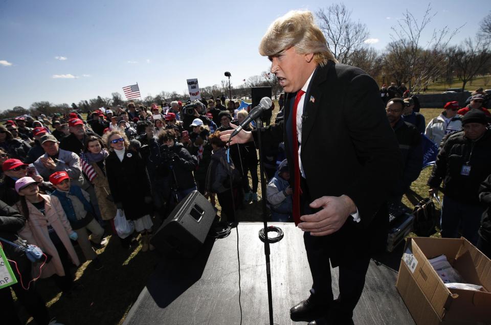 A supporter of President Donald Trump, comedian Dustin Gold of Nashville, Tenn., speaks during a rally at the National Mall in Washington, organized by the North Carolina-based group Gays for Trump, Saturday, March 4, 2017. The speakers at the rally talked about immigration, gay rights, and several other issues. (AP Photo/Manuel Balce Ceneta)
