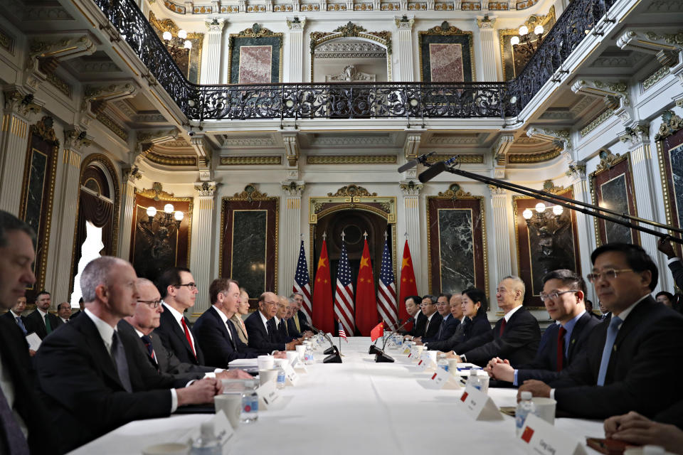 FILE - In this Thursday, Feb. 21, 2019, file photo, U.S. and Chinese delegations meet in the Indian Treaty Room in the Eisenhower Executive Office Building on the White House complex during continuing meetings on the U.S.-China bilateral trade relationship in Washington. Relief swept across world financial markets Monday after President Donald Trump pushed back a March 2 deadline in a trade dispute with China. But the respite might not last. (AP Photo/Jacquelyn Martin, File)