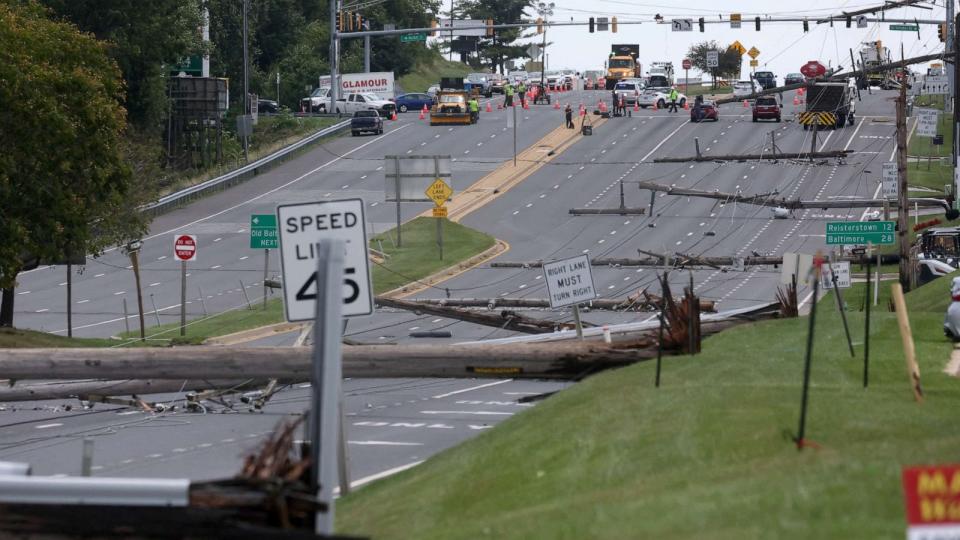 PHOTO: Downed power lines can be seen the day after a powerful storm swept the region along Baltimore Blvd in Westminster, Maryland, August 8, 2023. (Leah Millis/Reuters)