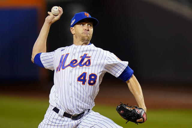 New York Mets starting pitcher Jacob deGrom (48) delivers against the San Diego Padres during the first inning of Game 2 of a National League wild-card baseball playoff series, Saturday, Oct. 8, 2022, in New York. (AP Photo/Frank Franklin II)
