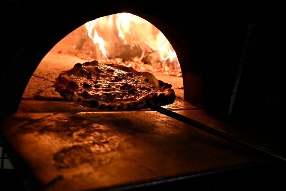 NYC is demanding pizza shops and matzah bakeries to cut their smoky pollutants by 75%. Paul Martinka