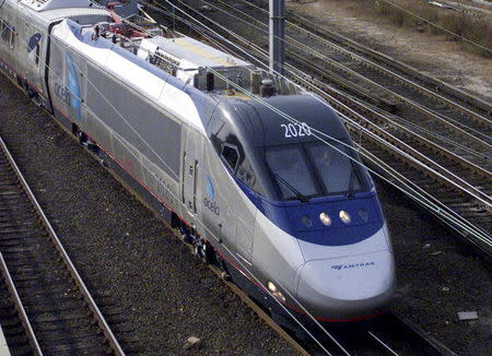 The Acela Express, North America's first high-speed passenger train, leaves New York enroute to Boston on its inaugural run in this November 16, 2000 file photo. REUTERS/Peter Morgan/Files