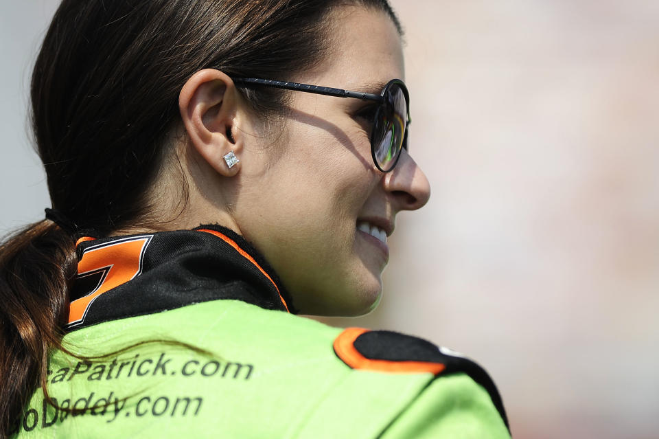 CONCORD, NC - MAY 26: Danica Patrick, driver of the #7 GoDaddy.com Chevrolet, stands on the grid during qualifying for the NASCAR Nationwide Series History 300 at Charlotte Motor Speedway on May 26, 2012 in Concord, North Carolina. (Photo by Jared C. Tilton/Getty Images for NASCAR)