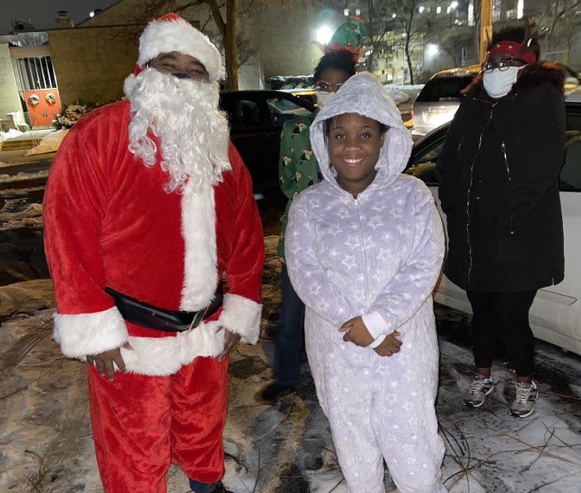 "When I went to parades, stores or watched television, I didn't see a Santa that looked like me," says Coby Owens, who now plays a Black Santa in his community. "So, sometimes it felt as though Santa wasn't meant for me or someone that looks like me." (Photo: Coby Owens)