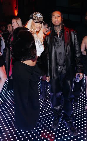 <p>@misha_yarkeev</p> Saweetie and Tyga at his 34th birthday party in Los Angeles.