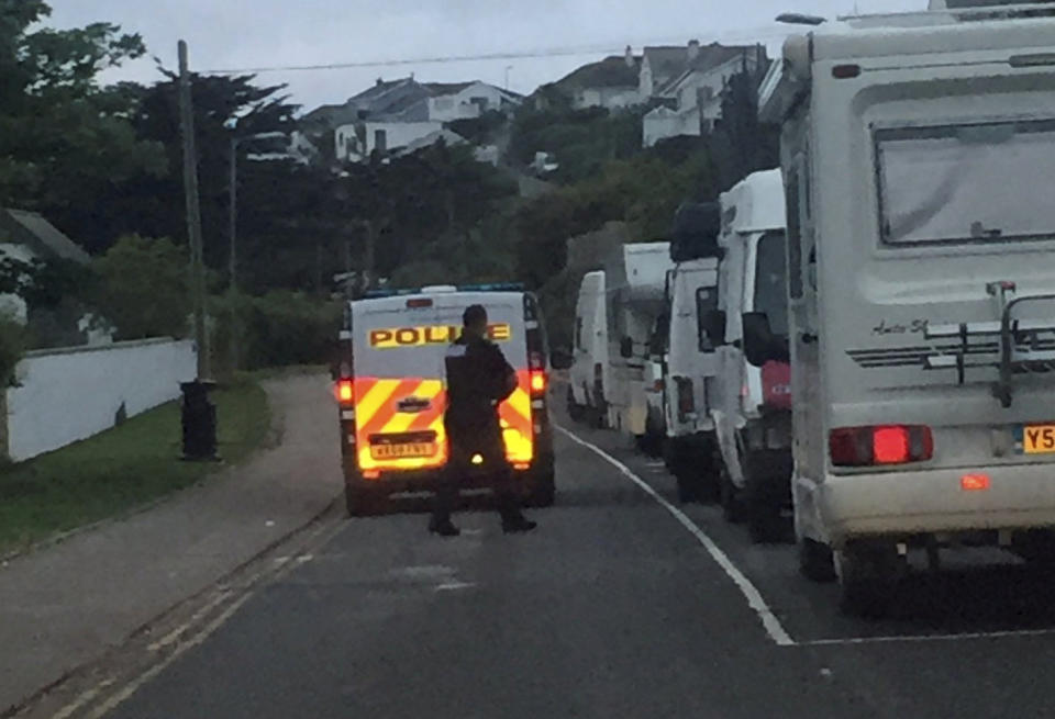 Police gave people who had camped in Newquay, Cornwall, an early morning wake-up call. (Picture: SWNS)