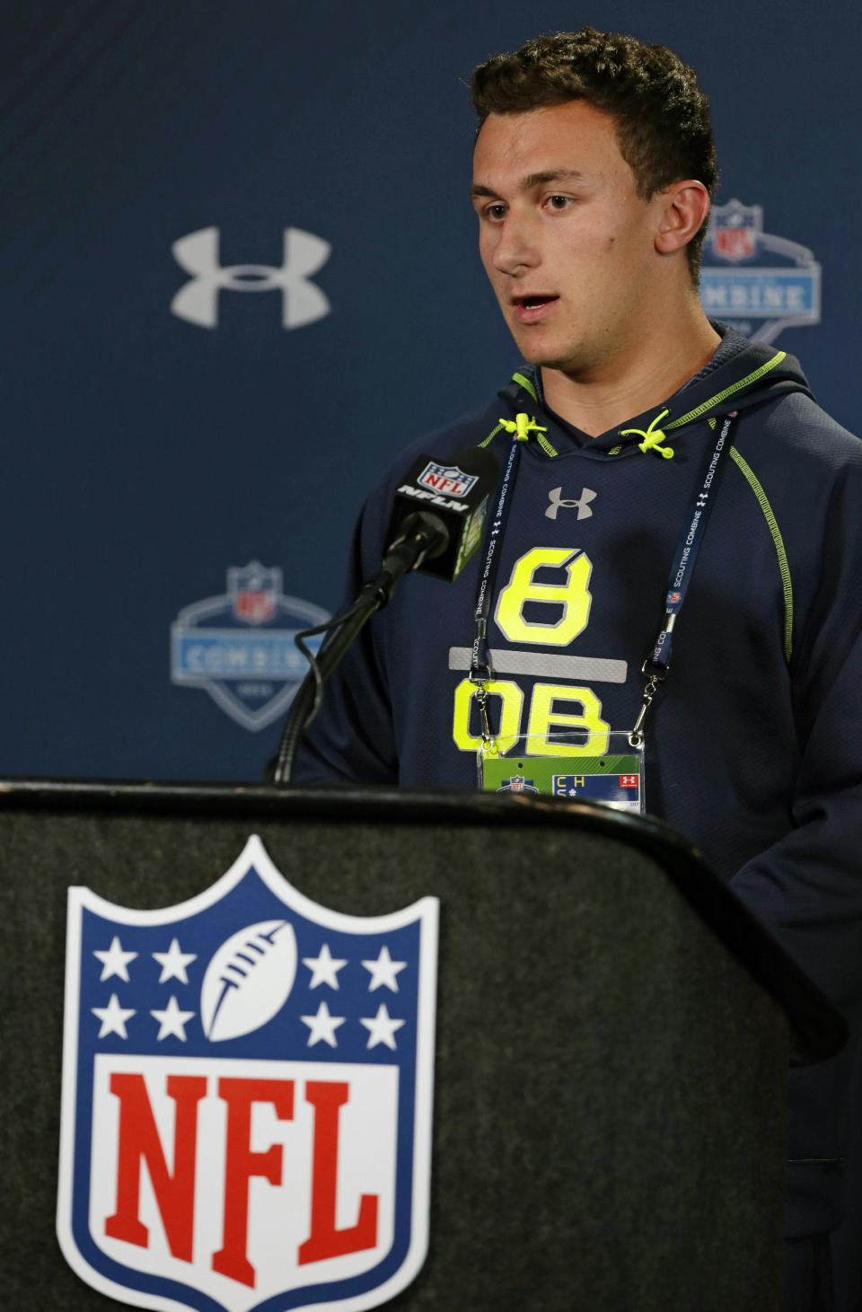 Texas A&M quarterback Johnny Manziel answers a question during a news conference at the NFL football scouting combine in Indianapolis, Friday, Feb. 21, 2014. (AP Photo/Michael Conroy)