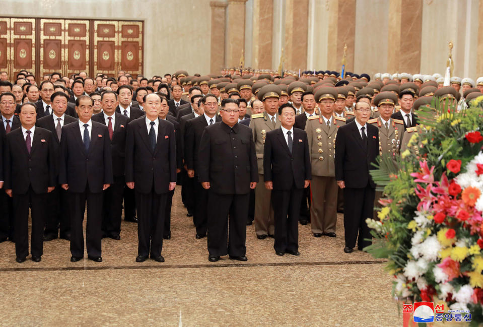 In this Sept. 9, 2018, photo provided by the North Korean government, North Korean leader Kim Jong Un, center, visits the Kumsusan Palace of the Sun, ahead of the country's military parade to mark its 70th anniversary as a nation, in Pyongyang, North Korea. Independent journalists were not given access to cover the event depicted in this image distributed by the North Korean government. The content of this image is as provided and cannot be independently verified. Korean language watermark on image as provided by source reads: "KCNA" which is the abbreviation for Korean Central News Agency. (Korean Central News Agency/Korea News Service via AP)