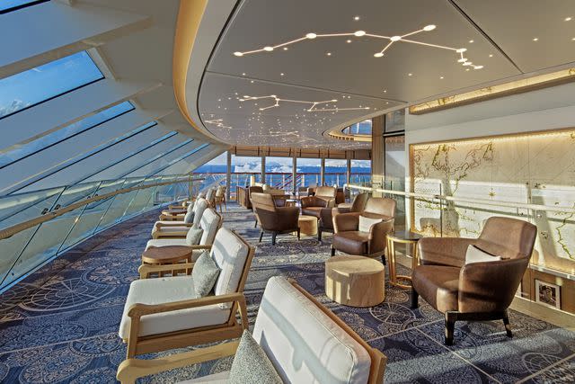 <p>Courtesy of Viking Cruises</p> The Explorers' Lounge on Viking Polaris.