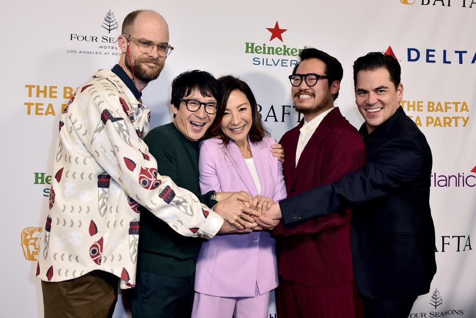 Daniel Scheinert, from left, Ke Huy Quan, Michelle Yeoh, Daniel Kwan, and Jonathan Wang arrive at the 2023 BAFTA Tea Party, Saturday, Jan. 14, 2023, at the Four Seasons Hotel Los Angeles at Beverly Hills, in Los Angeles. (Photo by Jordan Strauss/Invision/AP)