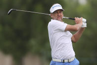 Ian Poulter of England plays a shot on the 3rd hole during the first round of the DP World Tour Championship golf tournament in Dubai, United Arab Emirates, Thursday, Nov. 21, 2019. (AP Photo/Kamran Jebreili)