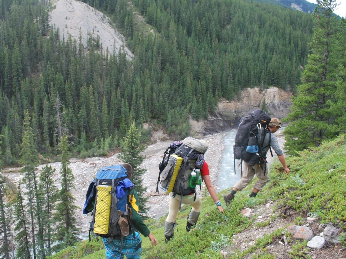 The Enviros wilderness therapy program sees participants hike and pursue other outdoor activities while on the path to recovery. (Enviros - image credit)