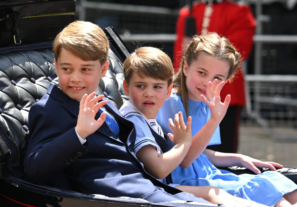 LONDON, ENGLAND - JUNE 02: Prince George, Prince Louis and Princess Charlotte in the carriage procession at Trooping the Colour during Queen Elizabeth II Platinum Jubilee on June 02, 2022 in London, England. The Platinum Jubilee of Elizabeth II is being celebrated from June 2 to June 5, 2022, in the UK and Commonwealth to mark the 70th anniversary of the accession of Queen Elizabeth II on 6 February 1952. Trooping The Colour, also known as The Queen's Birthday Parade, is a military ceremony performed by regiments of the British Army that has taken place since the mid-17th century. It marks the official birthday of the British Sovereign. This year, from June 2 to June 5, 2022, there is the added celebration of the Platinum Jubilee of Elizabeth II  in the UK and Commonwealth to mark the 70th anniversary of her accession to the throne on 6 February 1952. (Photo by Karwai Tang/WireImage)