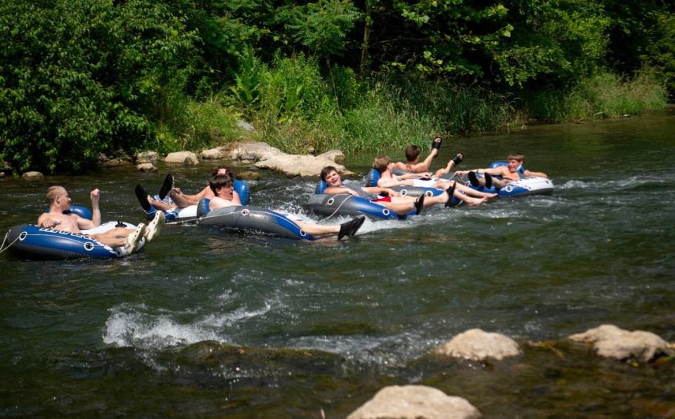 A group of friends from State College float down Spring Creek towards Milesburg on Friday, June 21, 2024.