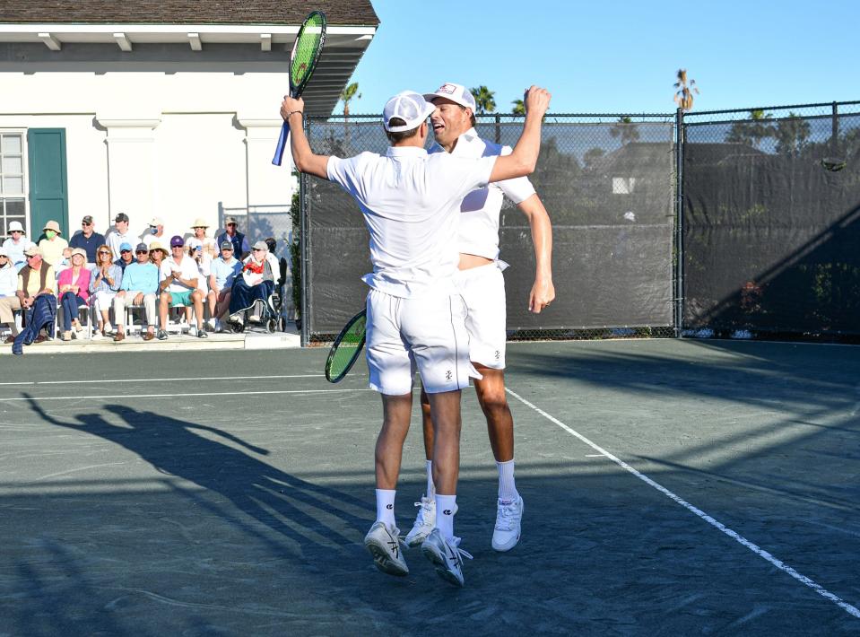 The Bryan Brothers do their famous “Chest Bump” after their win against Mardy Fish and Thomas Blake during an exhibition Saturday, Jan. 15, 2022, at the Windsor Club in Indian River County.