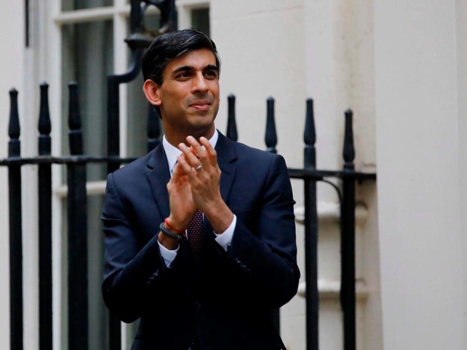 Rishi Sunak participates in a national "clap for carers" to show thanks for the work of Britain's NHS workers: AFP via Getty Images