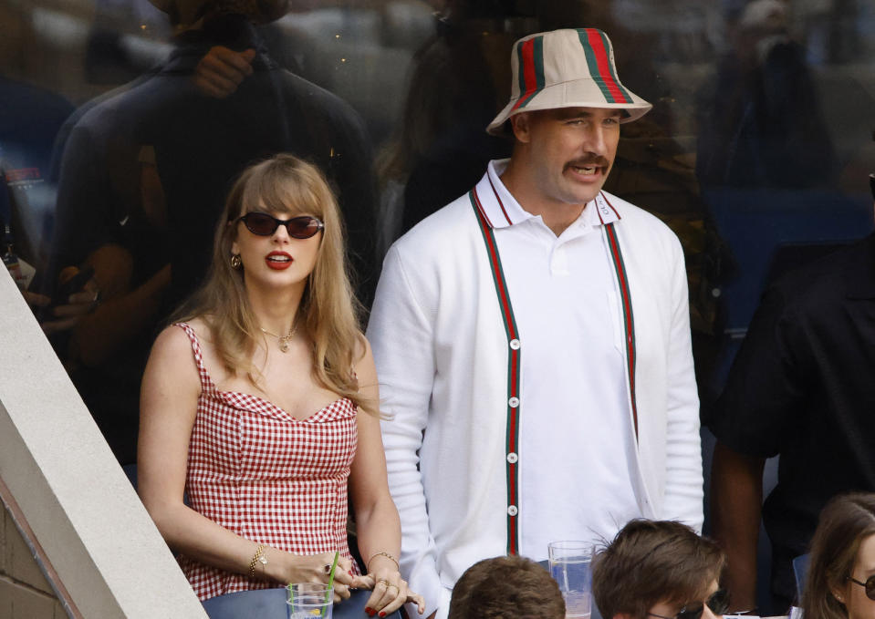 Tennis - U.S. Open - Flushing Meadows, New York, United States - September 8, 2024 Singer Taylor Swift and Kansas City Chiefs' Travis Kelce are seen during the final match between Italy's Jannik Sinner and Taylor Fritz of the U.S. REUTERS/Eduardo Munoz