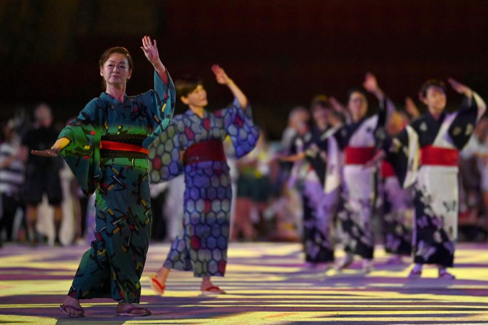 <p>Dancers perform during the closing ceremony of the Tokyo 2020 Olympic Games, at the Olympic Stadium, in Tokyo, on August 8, 2021. (Photo by Daniel LEAL-OLIVAS / AFP) (Photo by DANIEL LEAL-OLIVAS/AFP via Getty Images)</p> 