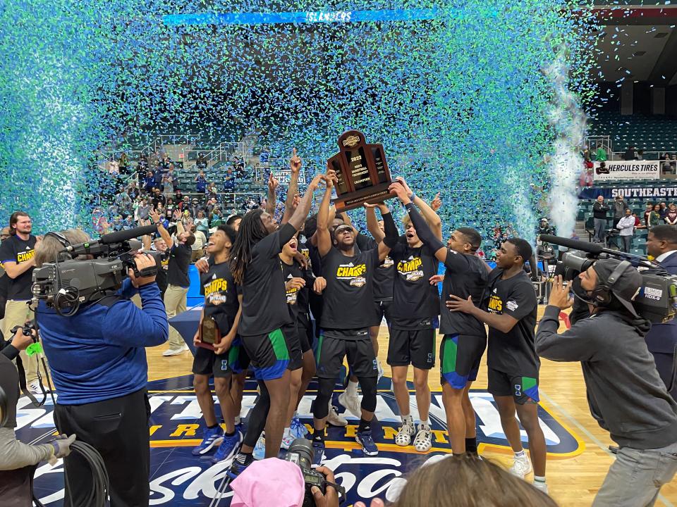 Texas A&M-Corpus Christi men's basketball players celebrate winning the Southland Conference championship and earning a berth in the NCAA Tournament after defeating Southeastern Louisiana in the Southland title game on Saturday, March 12, 2022 in Katy, Texas.