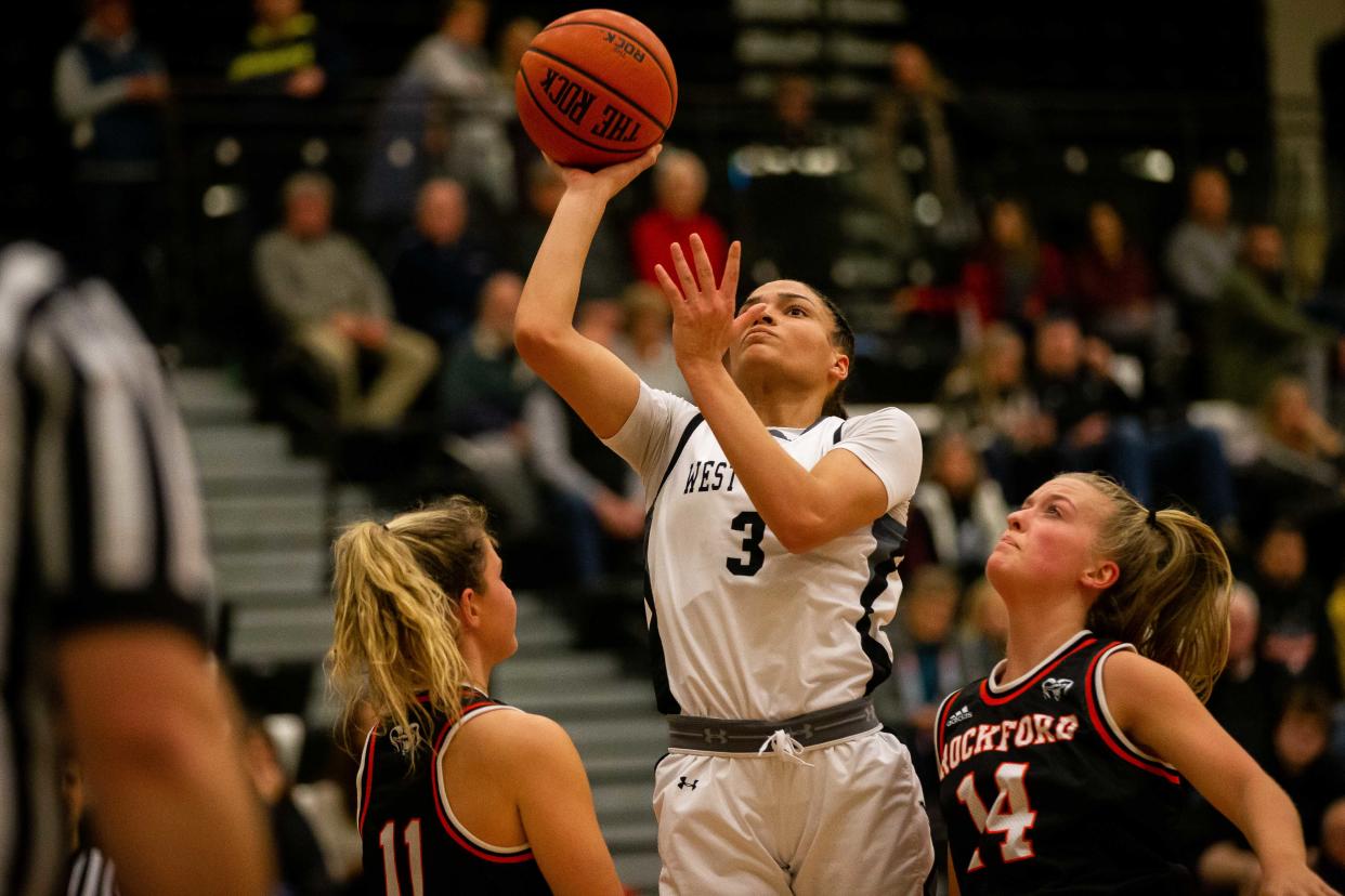 West Ottawa's Gabby Reynolds drives into the paint during a game against Rockford Thursday, Jan. 19, 2023, at West Ottawa High School. 