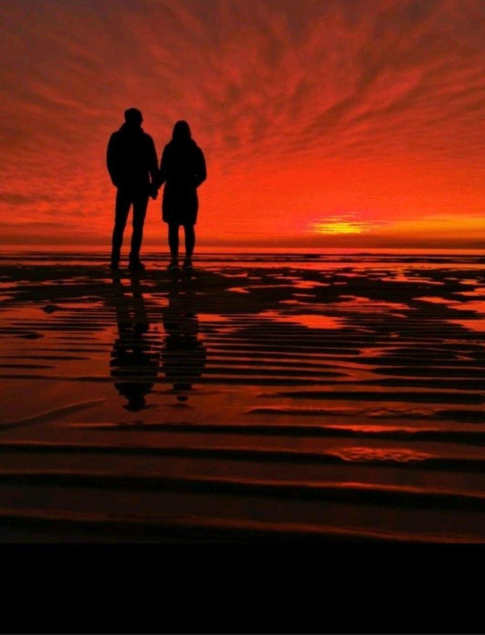 Two people on a beach