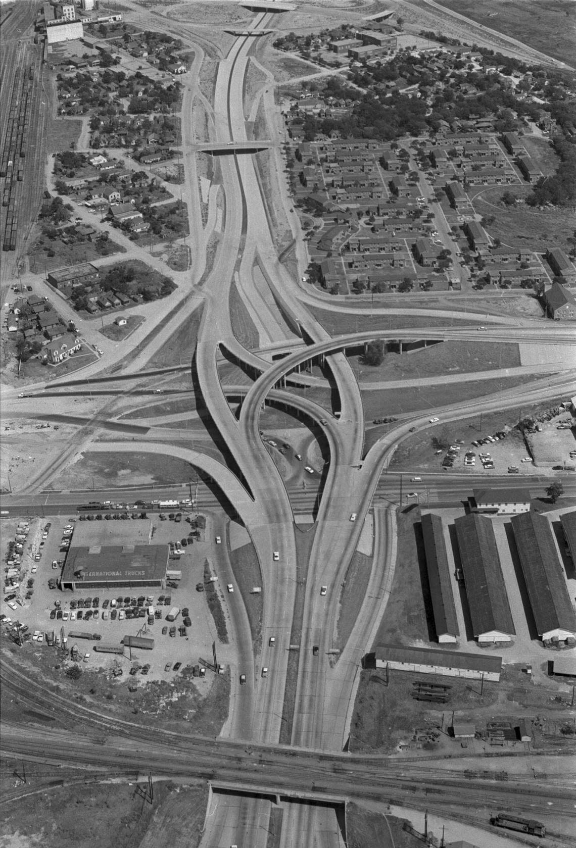 Sept. 9, 1960: An aerial view looking northward of the Fort Worth “Mixmaster” where the North-South Freeway (now Interstate 35), Dallas-Fort Worth Turnpike (now Interstate 30) and downtown streets meet. A six-lane East Lancaster Avenue is seen going under the interchange, which has since been reconfigured. Few of the buildings near the interchange exist today.