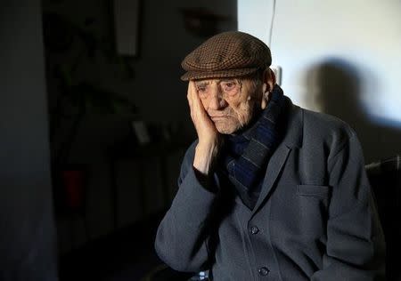 Francisco Nunez, 112, poses for a portrait at his home in Bienvenida, Badajoz, southern Spain, December 11, 2016. REUTERS/Andrea Comas/Files