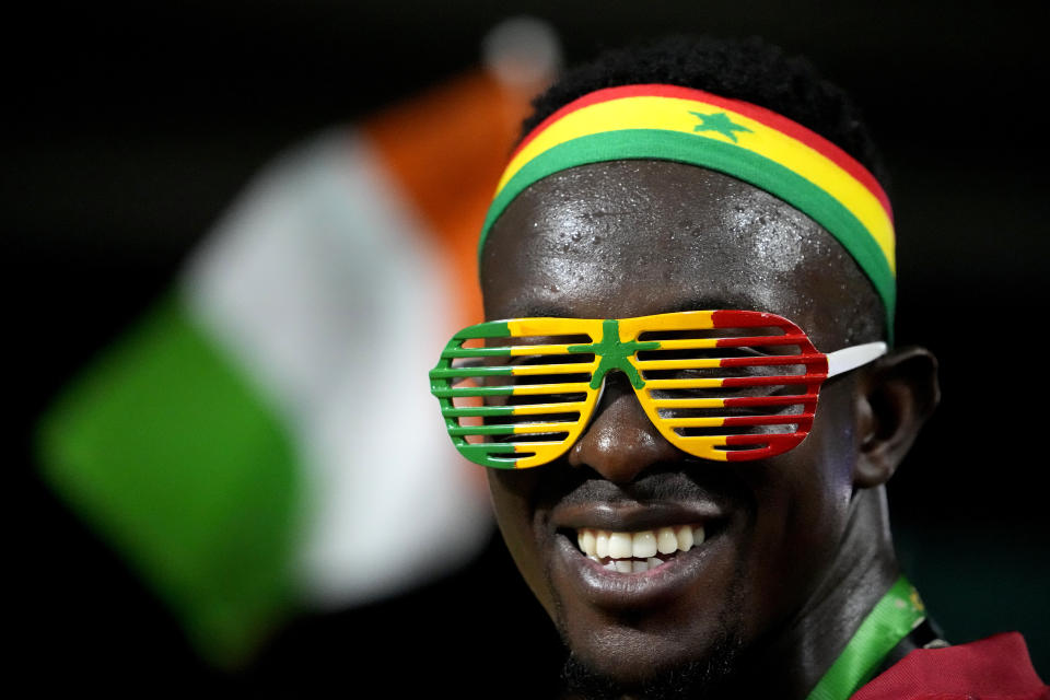 Senegal celebrate at the end of the African Cup of Nations Group C soccer match between Senegal and Cameroon, at the Charles Konan Banny stadium in Yamoussoukro, Ivory Coast, Friday, Jan. 19, 2024. (AP Photo/Sunday Alamba)