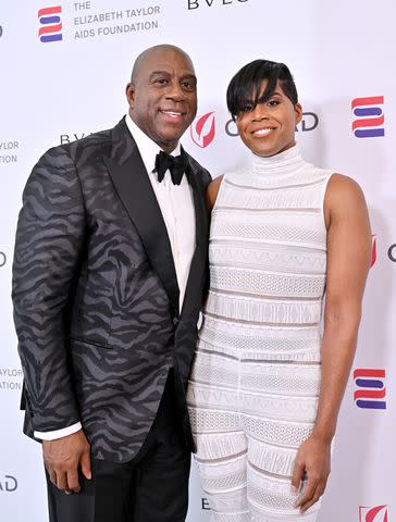 <p>Axelle/Bauer-Griffin/FilmMagic</p> Magic Johnson and EJ Johnson attend The Elizabeth Taylor Ball to End AIDS at The Beverly Hills Hotel on September 21, 2023 in Beverly Hills, California