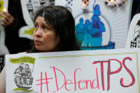 <p>Salvadoran immigrant Mirna Portillo watches on during a media conference at the New York Immigration Coalition following U.S. President Donald Trump’s announcement to end the Temporary Protection Status for Salvadoran immigrants in Manhattan, New York City,Jan. 8, 2018. (Photo: Andrew Kelly/Reuters) </p>