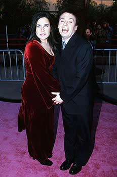 Mike Myers and his wife Robin on their way to witness Mike's three-role extravaganza