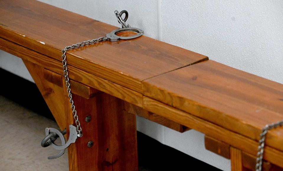 Manatee County Government officials are still working to remodel the building before providing transitional housing for local families that are at battling homelessness. The handcuff bench is one item that will be replaced with furniture that is suitable for a family-friendly facility.