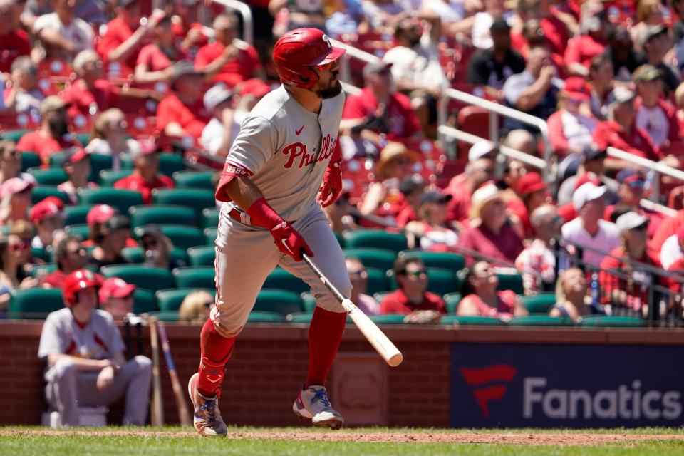 Philadelphia Phillies' Kyle Schwarber watches his solo home run during the fifth inning of a baseball game against the St. Louis Cardinals Sunday, July 10, 2022, in St. Louis. (AP Photo/Jeff Roberson)