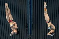 China's Cao Yuan and Zhang Yanquan compete in the men's synchronised 10m platform final diving event at the London 2012 Olympic Games at the Olympic Park in London. The Chinese pair took gold