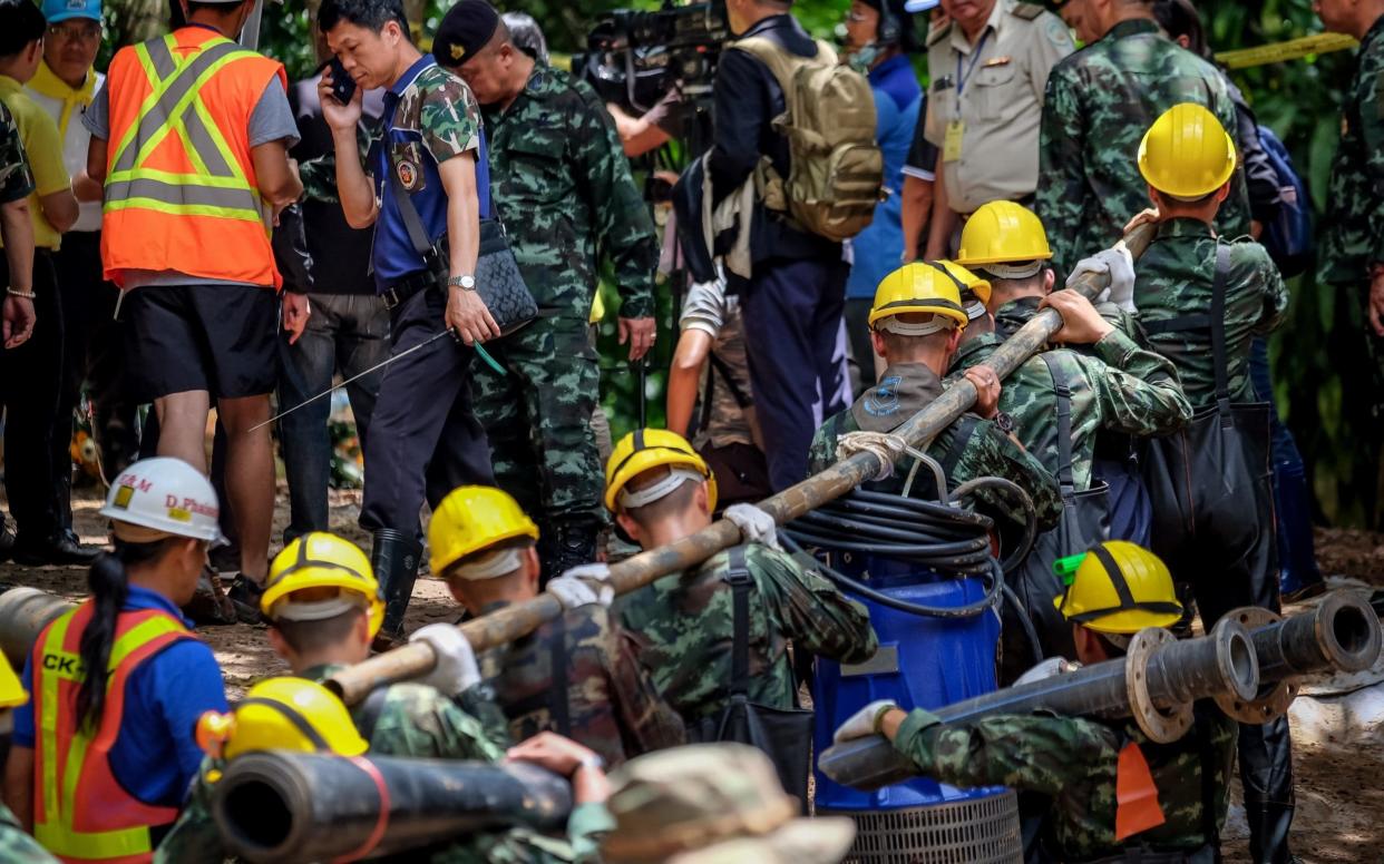 Rescue workers operate around the clock to free the 12 Thai boys and their football coach - Getty Images AsiaPac