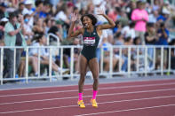 Tara Davis-Woodhall, celebrates after winning the women's long jump during the U.S. track and field championships in Eugene, Ore., Sunday, July 9, 2023. (AP Photo/Ashley Landis)