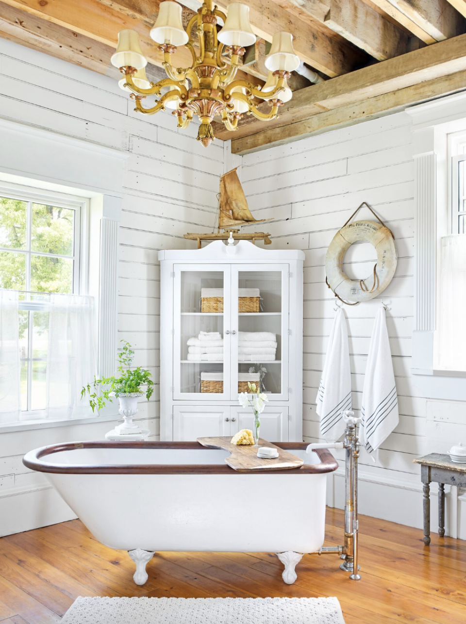 bathroom storage ideas, white cabinet with clear glass doors in large bathroom