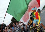 Astana team rider Vincenzo Nibali of Italy celebrates with supporters as he parades to celebrates his overall victory after the 137.5 km final stage of the 2014 Tour de France, from Evry to Paris Champs Elysees, July 27, 2014. REUTERS/Jean-Paul Pelissier (FRANCE - Tags: SPORT CYCLING)