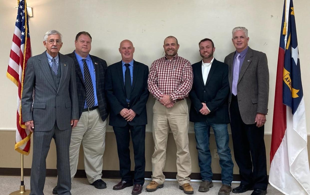 Madison County's new interim county manager Rod Honeycutt, pictured third from left, is seen here with Madison County Board of Commissioners, from left, Bill Briggs, Matt Wechtel, Jeremy Hensley, Alan Wyatt and Michael Garrison.