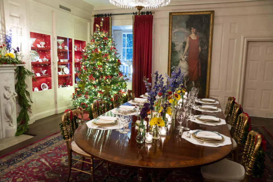 FILE - The China Room of the White House is decorated for the holiday season during a press preview of the White House holiday decorations, Nov. 29, 2021, in Washington. A White House tour is practically a must-do in Washington, though the experience can leave some guests asking questions about spaces they don’t get to see, like the Oval Office. The White House Historical Association has a plan to answer those questions when it opens “The People’s House: A White House Experience,” in the fall of 2024. (AP Photo/Evan Vucci, File)