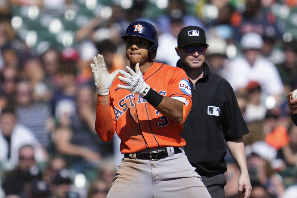 Houston Astros' Jeremy Pena (3) celebrates his two-run triple against the Detroit Tigers in the eighth inning of a baseball game, Sunday, Aug. 27, 2023, in Detroit. (AP Photo/Paul Sancya)