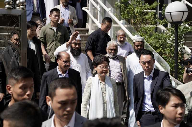 Hong Kong's Chief Executive Carrie Lam exits the Kowloon Mosque, or Kowloon Masjid and Islamic Centre, in Tsim Sha Tsui district in Hong Kong