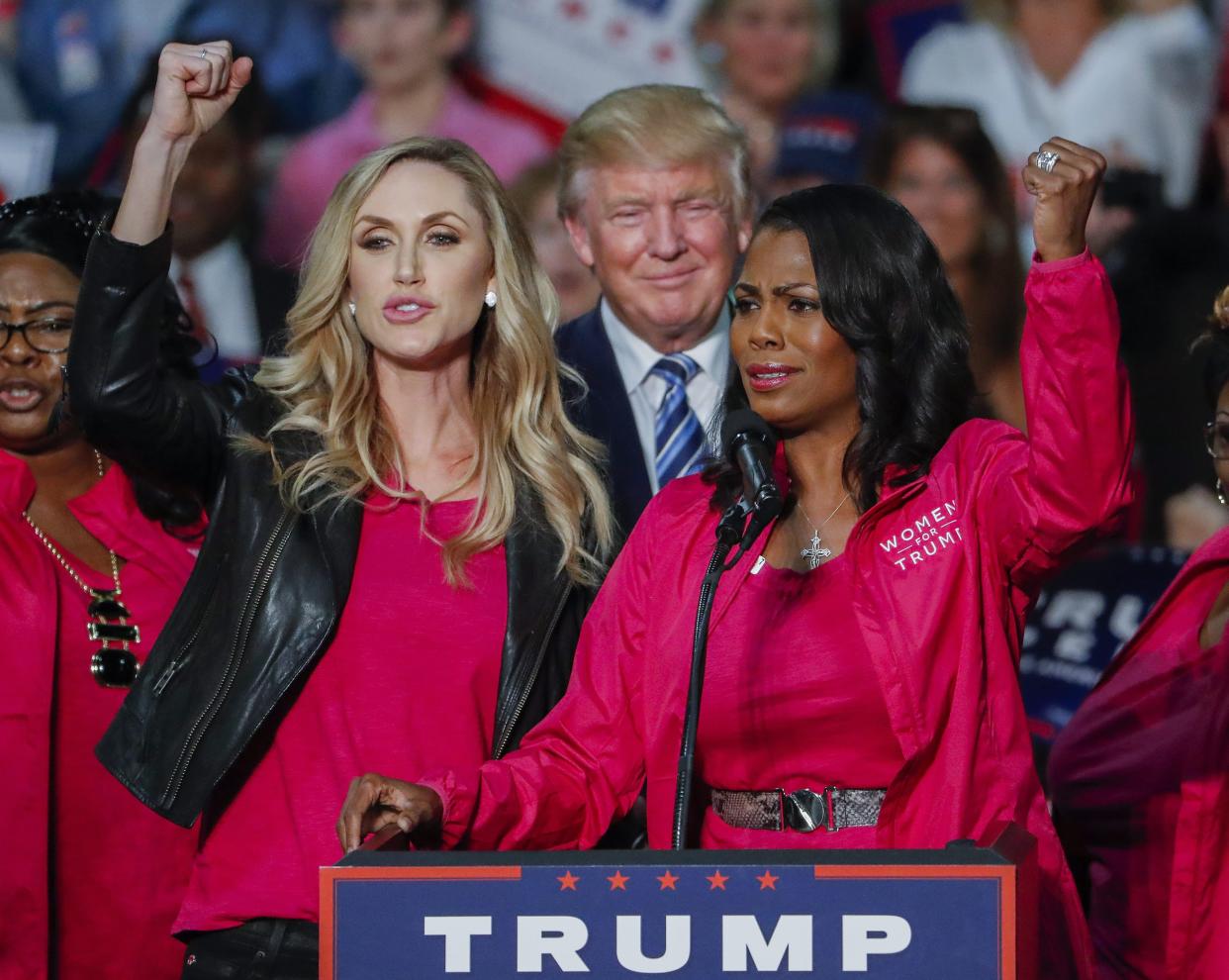 Donald Trump with Lara Trump and Omarosa Manigault