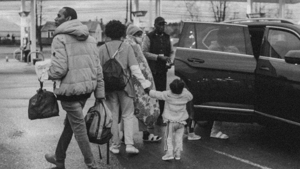 Yermain Piñango rushes to get the women and girls, some of whom came from Colombia, in the back of Abdul’s Volkswagen SUV.