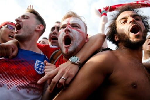 England fans celebrate after their team beat Sweden in the World Cup quarter-finals