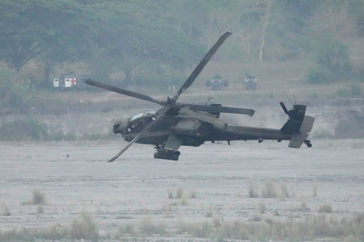 File: A US Apache helicopter maneuvers during a joint military exercise in Philippines on Friday, 14 April 2023  (AP)