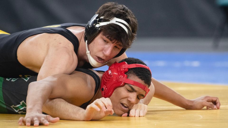 Southern's Matt Henrich is shown controlling Camden Catholic's Kage Jones during the state 157-pound final. Henrich won the bout 2-1.